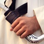 What is Kirpan? Why do Sikhs carry a kirpan around what is the purpose of the kirpan is it legal to carry around in the UK, Australia, Canada and USA?
