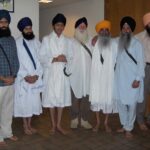 Why do so many Sikhs have the last name Singh or Kaur?