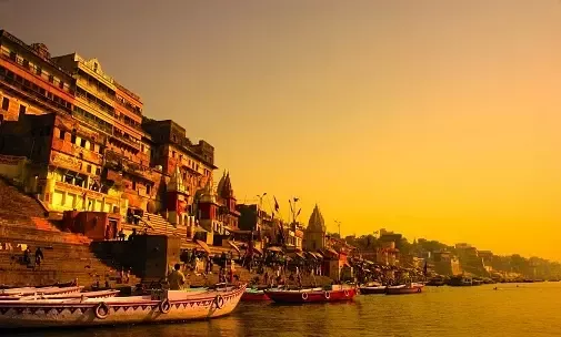 18 Interesting Facts About Varanasi That You Need To Know- Kashi Vishwanath's history One of the 12 Jyotirlingas, this temple of Lord Shiva receives the most visitors in Varanasi. In its history, it has been demolished and rebuilt at least five times. Rani Ahilya Bai Holkar renovated it for the final time in 1780. The Gyanvapi Mosque and the temple are now housed within the same walls. After he had destroyed the temple during the Mughal invasion, Aurangzeb constructed the latter. The amount of Ghats The most well-known ghats in the city include Dashashwamedh Ghat, Manikarnika Ghat, Chet Singh Ghat, Scindia Ghat, and Assi Ghat. There are more than 80 ghats in total. These ghats are employed for both residential and ceremonial uses. A few of the ghats are just intended for cremations. Manikarnika Ghat The most genuine and regional supply of trinkets and silk is said to be found in the lanes close to the Manikarnika Ghat. The fact that this Ghat is available for cremations around-the-clock is perhaps its most intriguing feature. This location never dies since it is one of the most revered ghats for cremation, a location where the deceased can find salvation. The Harmony Bookstore Now, tell me why a bookstore would slash this list. Check for a friendly owner. Done. Exotic books. Check for a varied collection. The seductive aroma of both new and old books, checked! It is a favorite with both tourists and locals and is one of the most well-known bookshops in the city. Banaras Hindu College Okay, we all know that the largest university in Asia is Banaras Hindu University. The Bharat Kala Bhavan, a museum with no fewer than one lakh relics and things on display, is also located there. The BHU libraries are a treasure trove of more than 15 million books, which is additional fascinating information. Heaven for book lovers! Bhang Lassi Bhang is well-known in Varanasi (cannabis). In addition to the well-known Thandai, bhang pakoras, and ladoos, the popularity of bhang lassi is rising in the city. At least in Varanasi, it is a delicacy and legal. Banarasi Paan They claim that everything is folded. The Banarasi Paan is widely available throughout India. However, one can only find genuine flavor in Varanasi, the city of origin. Krishnamurti Retreat and Study Center The area is a philosopher's paradise and one of Varanasi's most serene spots. It has a collection of Jiddu Krishnamurti's writings, a library, a place for solitude, a room for debate, and several cottages for a tranquil stay. Kachori Gali The Kachori Gali is another name for Vishwanath Gali. Delicious, hot, fried kachoris served with a selection of chutneys. Enough already! The Banaras Subah The Subah-e-Banaras is the best way to start your day in Varanasi, except for the evening Ganga Aarti and the yearly Dhrupad Mela (in image). The air is filled with music and Vedic chantings every morning at Assi Ghat. The duration is roughly two hours. Sheshna Well Are myths and legends your thing? Every year on the eve of Naag Panchami, a well in Varanasi's Jaitpura neighborhood, which is home to the Karkotak Nageshwar Shivlinga, is drained. According to legend, there is a "portal to hell" at the bottom of the well that is watched after by serpents. Yes. Narada Ghat It has the name of a well-known celibate, Narad Muni (Brahmachari). Interestingly, lovers and couples avoid this Ghat because they think it's cursed. Frog Wedding Frogs are wed in the Ashwamedh Ghat every year during the monsoon season to appease the rain Gods. Famous literary figures' birthplaces Munshi Premchand, Tulsidas, Bhartendu Harishchandra, Nazeer Banarsi, and many other famous people were born in Varanasi. The hometown of renowned musicians All three of the great sitarists—Pandit Ravi Shankar, Ustad Bismillah Khan, and the queen of thumris, Girija Devi (pictured)—were natives of this country. Lord Shiva and Goddess Parvati's residence There is a reason Varanasi is regarded as the nation's holiest city. Lord Shiva and Goddess Parvati are said to have lived in the world's oldest continuously inhabited city. According to legend, it is where God resides, and anyone who takes their final breath here is saved. Strange Things In The City You can find folks who have weird beliefs in Varanasi. People catching frogs and marrying them is one of the oddest things that occur here. People still adhere to this ancient custom in an effort to appease the rain gods. Typically, it is carried out when rain is delayed. Asia's Biggest University Is Here Do you know that Benaras Hindu University is located in the city? The institution, which was established by the founder Madan Mohan Malviya, is the biggest in Asia. Due to the city's affinity for writers like Tulsi Das and Munshi Prem Chand, Varanasi is frequently referred to as the center of literature.